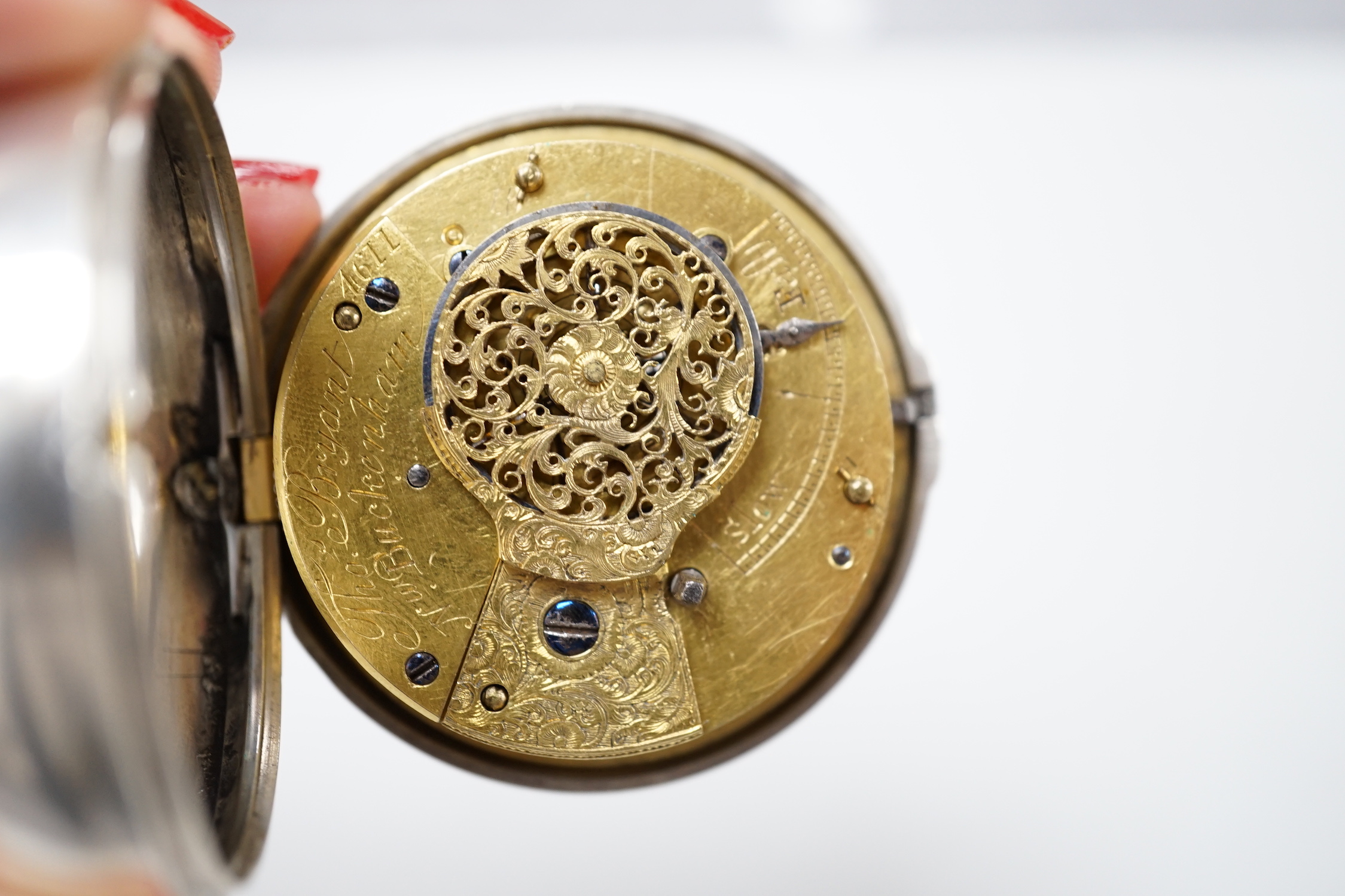 A 19th century silver pair cased keywind verge pocket watch, by Bryant of Buckenham, case diameter 55mm.